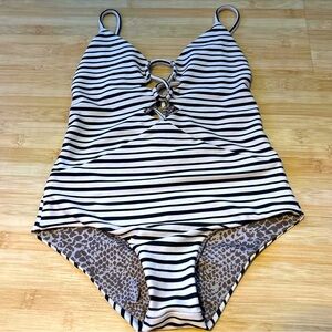 Really cute acacia kids one piece.